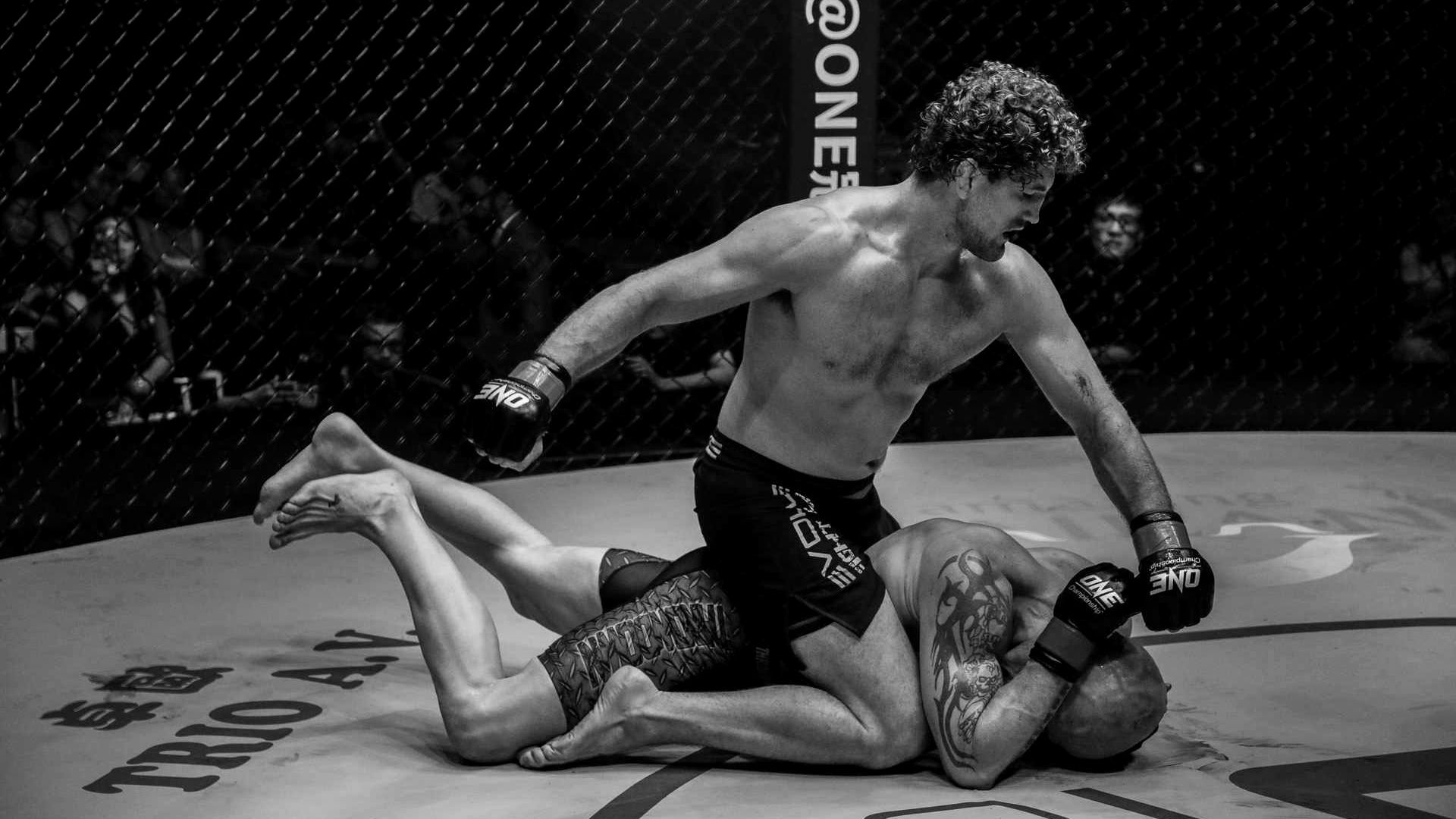 Explore the evolution of grappling in modern MMA, from the early days of BJJ to the rise of Dagestani chain wrestling and the tactical use of the cage.