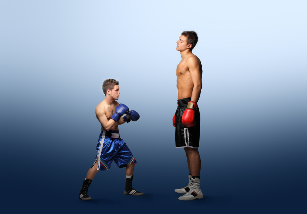 Struggling against taller fighters? Master the tactics of range, footwork, and leverage with our expert guide to fighting taller opponents in MMA.